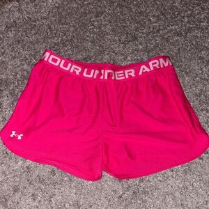 Under Armour Size YXL Bright Pink Athletic Shorts, Will Fit Women’s Small